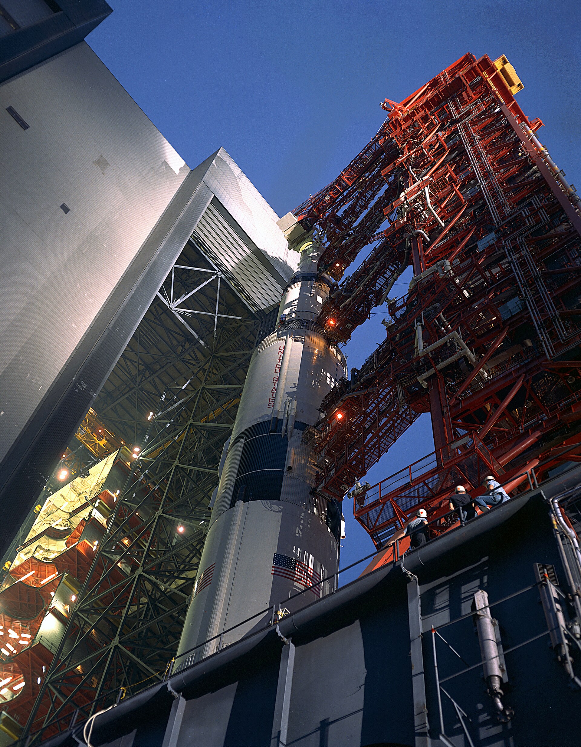 Crawler-transporter carrying a mobile launcher across the crawlerway.